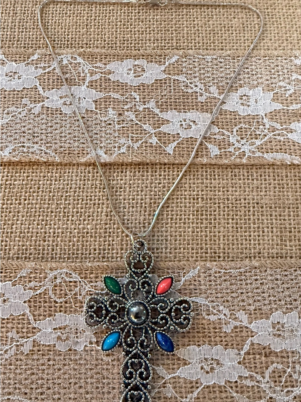 Avon Silver-Tone Cross Necklace with Green, Pink, Turquoise, and Blue Accents